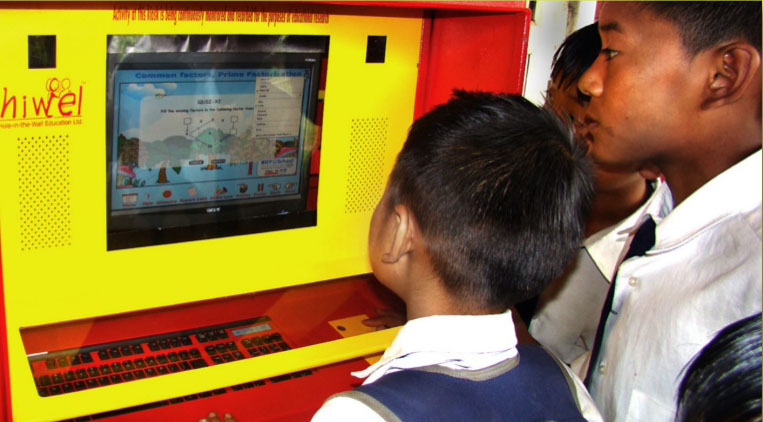 School children using a computer